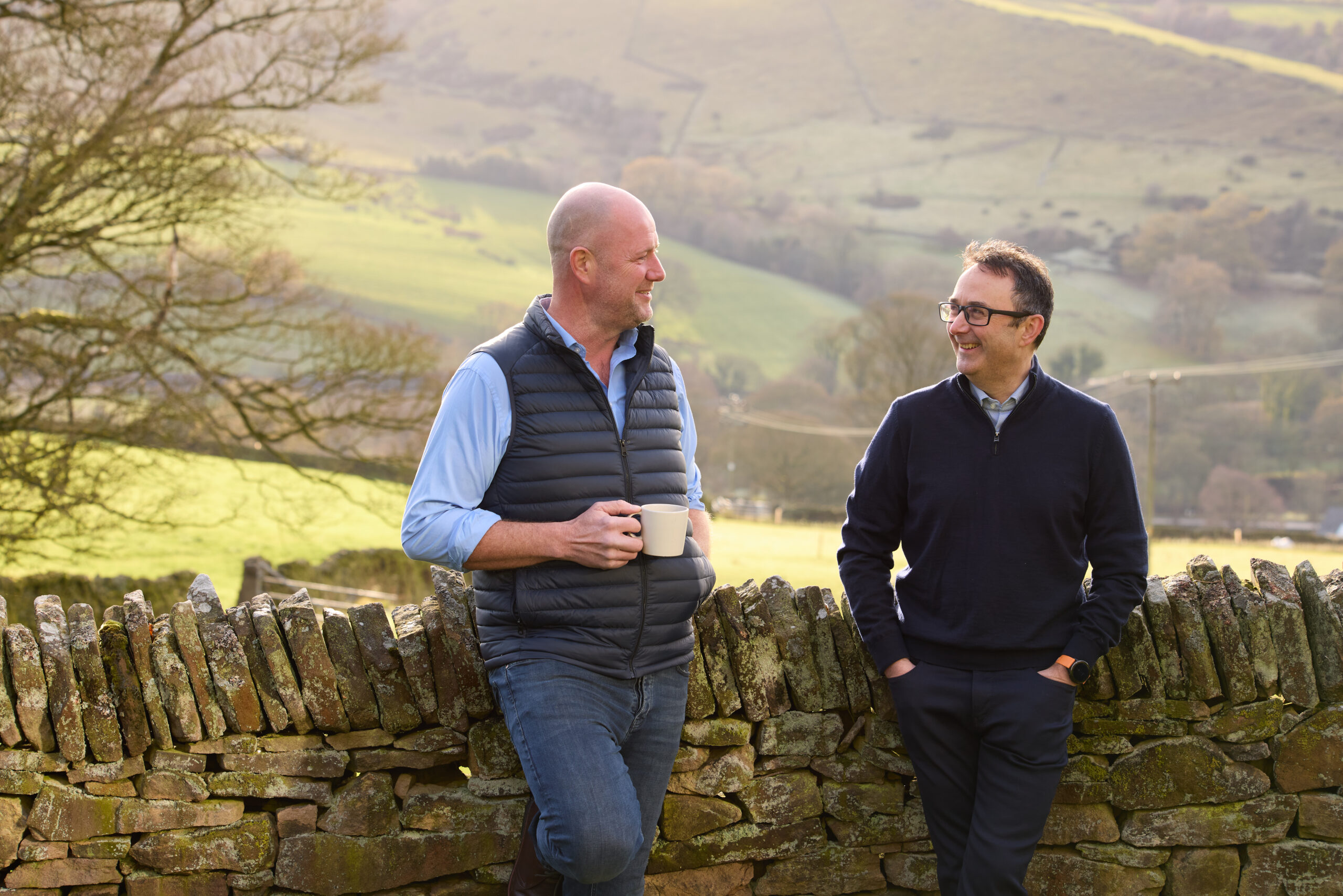 Chris Carter and David Healey laughing together, Carter & Carter Solicitors